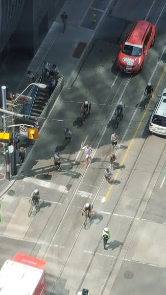 The PanAm Torch Relay Passing my office tower