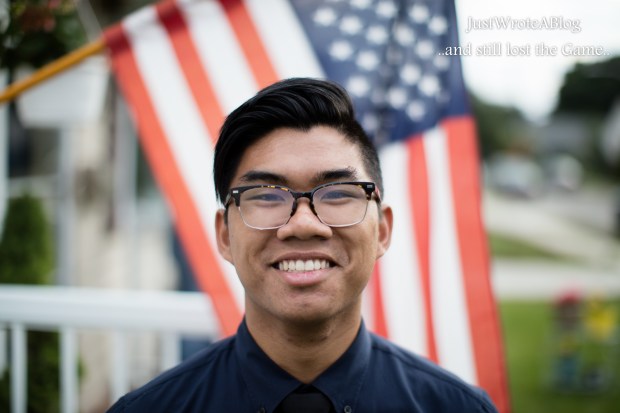 He is Cheesecake himself, enjoying after 4 years of misery, I mean High School.  1/2000 F/1.2 ISO 200 